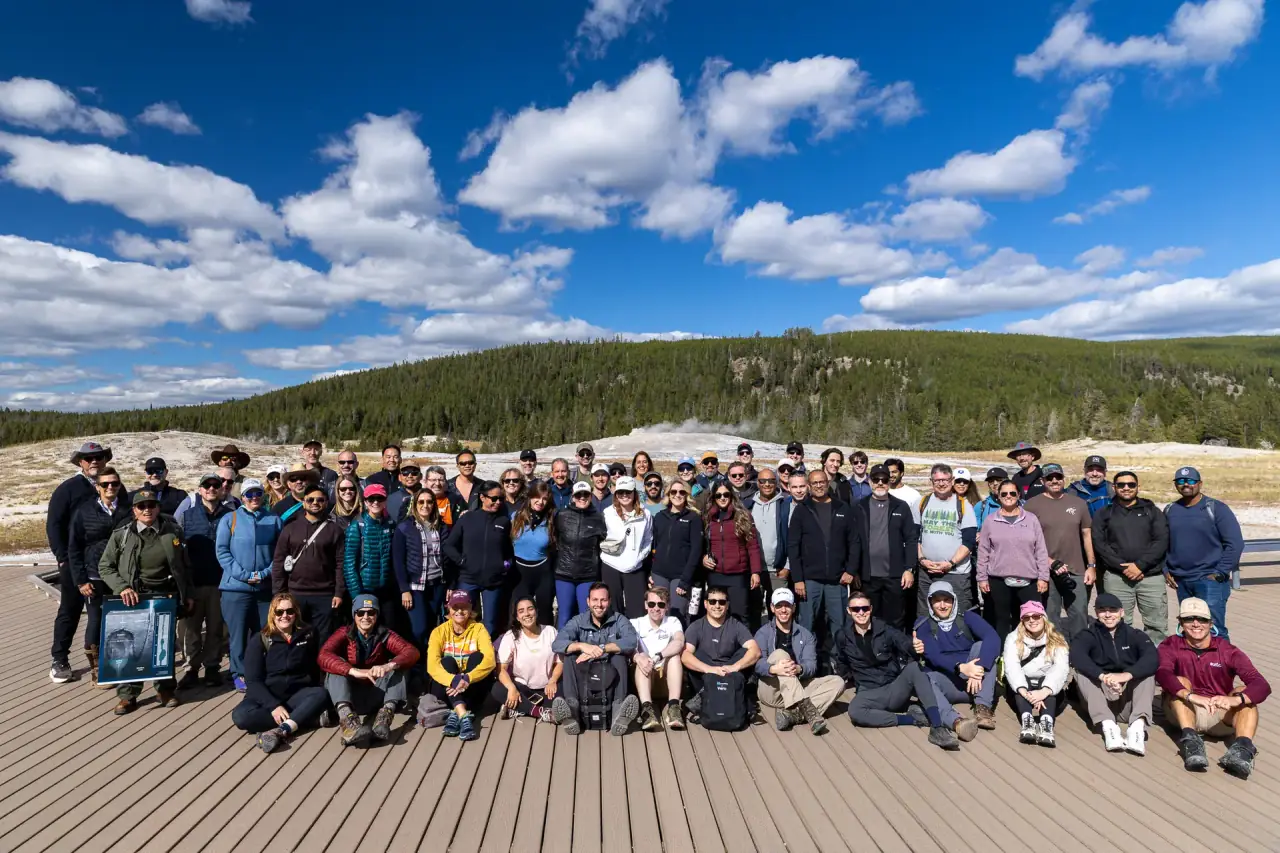 CISO Ascent's Fall 2026 retreat group together on a Yellowstone boardwalk